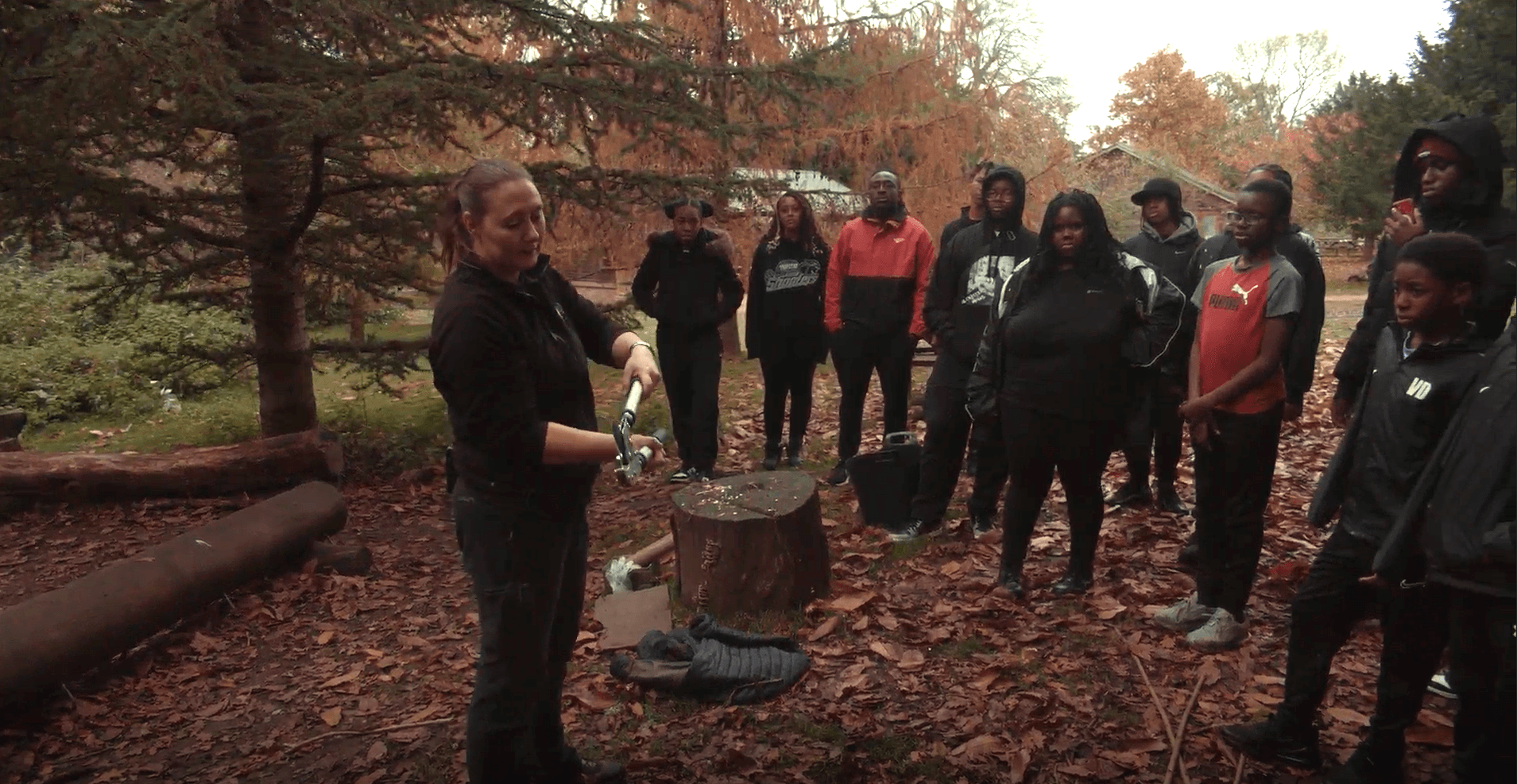 A group of children learning wood crafts in the Surrey Hills National Landscape