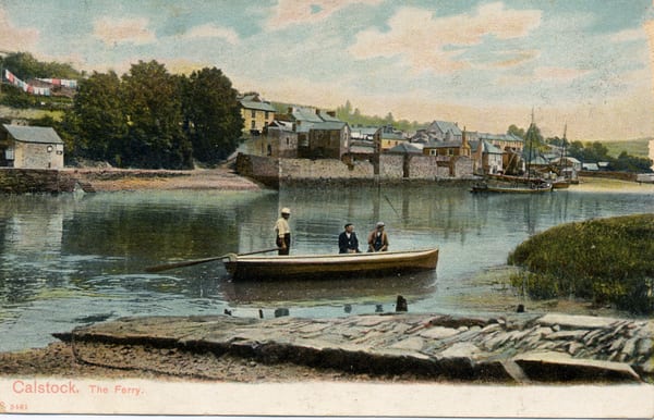 An old colour postcard shows a small passenger ferry with a skipper and two passengers aboard. The image shows a busy but beautiful early 1900s industrial landscape in the background, on the other side of the river